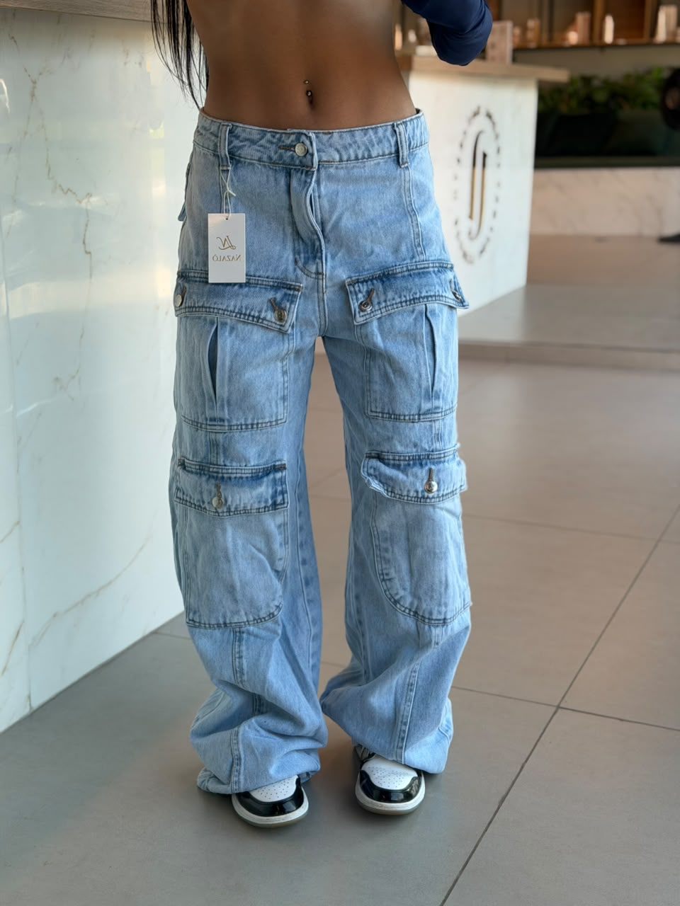 CALÇA CLARA BOLSOS